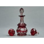 A FACETED RUBY FLASHED GLASS SCENT BOTTLE AND STOPPER, MID 19TH C, ENGRAVED WITH TRAILING