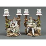 A PAIR OF VOLKSTEDT SHEPHERD AND SHEPHERDESS CANDELABRA, LATE 19TH C, 19CM H, CROSSED PITCHFORKS