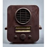 A BRITISH ART DECO BAKELITE MAINS RADIO, C1930, 45CM H Small crack in one side of case and dusty/