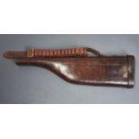 A LEATHER LEG O' MUTTONSHOTGUN CASE, C1900, WITH BRASS LOCK AND OLD REPLACEMENT LEATHER HINGE,