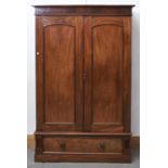 A VICTORIAN MAHOGANY WARDROBE, C1870, THE FLARED CORNICE WITH FIGURED FRIEZE ABOVE A PAIR OF