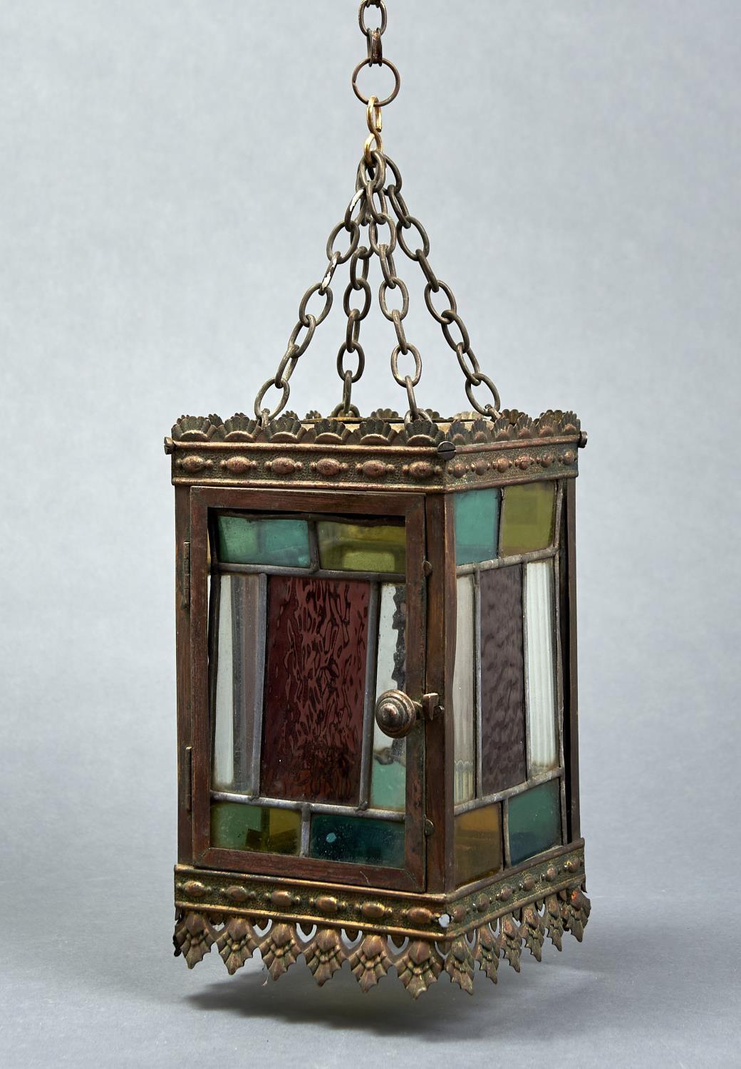 AN EDWARDIAN STAMPED BRASS AND LEADED GLASS HALL LANTERN, C1910,  28CM H Much old accretion of