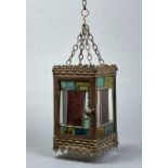 AN EDWARDIAN STAMPED BRASS AND LEADED GLASS HALL LANTERN, C1910,  28CM H Much old accretion of