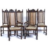 A SET OF SIX OAK DINING CHAIRS, C1930'S, FOLIATE CARVED TOP RAILS ABOVE CANED VERTICAL PANELS