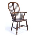 A WINDSOR HIGH BACK ELBOW CHAIR, C1870, THE PIERCED SPLAT FLANKED BY SPINDLES, DISHED BOARDED ELM