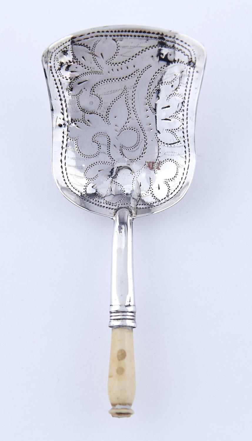 A VICTORIAN SILVER CADDY SPOON WITH WRIGGLEWORK TO THE BOWL, TURNED BONE HANDLE, 85MM L, MAKER'S