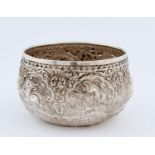 A BURMESE SILVER REPOUSSE BOWL, C1900, IN THE FORM OF AN ALMS BOWL, 12CM DIAM, 7OZS 3DWTS Good