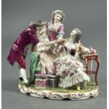 A GERMAN PORCELAIN GROUP OF A LADY, MAID AND GENTLEMAN INSPECTING A BOLT OF CLOTH, EARLY 20TH C,