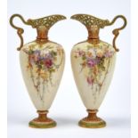 A PAIR OF GRAINGER WORCESTER EWERS WITH PIERCED SHOULDER AND NECK, 1890, DECORATED WITH ROSES, THE