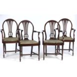 FOUR HEPPLEWHITE STYLE MAHOGANY ELBOW CHAIRS, MID 20TH C, THE ARCHED BACK WITH WAISTED SPLAT