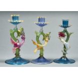 THREE SIMILAR VENETIAN COLOURED GLASS WINGED DRAGON CANDLESTICKS, LATE 19TH C, ONE WITH GIRASOL