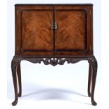 A REPRODUCTION MAHOGANY DRINK'S CABINET IN GEORGE III STYLE, C1970'S, THE TOP WITH FOLIATE CARVED