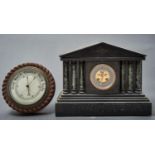 AN OAK ANEROID BAROMETER IN CIRCULAR ROPE CARVED MOUNT, C1900, 23CM DIAM AND A BELGE NERO AND