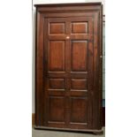 AN EARLY GEORGE III OAK STANDING CORNER CUPBOARD, C1760, FLARED CORNICE ABOVE A SINGLE RAISED