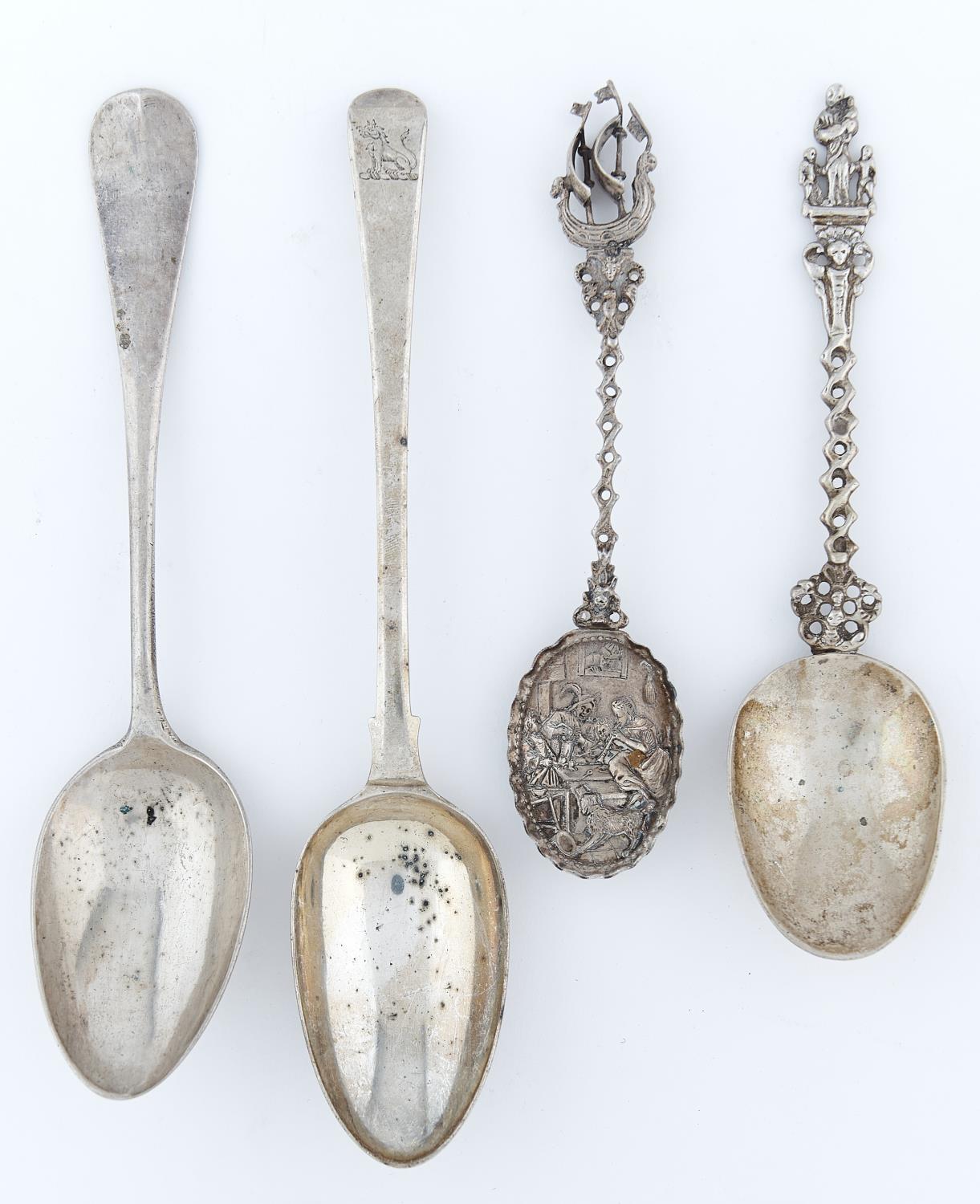 A GEORGE III SILVER TABLE SPOON, CRESTED, MAKER WW, LONDON 1762, TWO DUTCH DECORATIVE SILVER SPOONS,