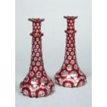 A PAIR OF ENGLISH RUBY CASED AND CUT  GLASS  DECANTERS, C1845, 22.5CM HComparative Literature: