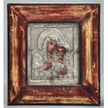 A RUSSIAN ICON OF MARY AND THE CHRIST CHILD IN SILVER FRAME, ENGRAVED AND WRIGGLEWORK DECORATED