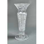AN ENGLISH CUT GLASS VASE, C1930 OF TAPERED CYLINDRICAL FORM WITH WAISTED NECK, HOBNAIL, STAR AND