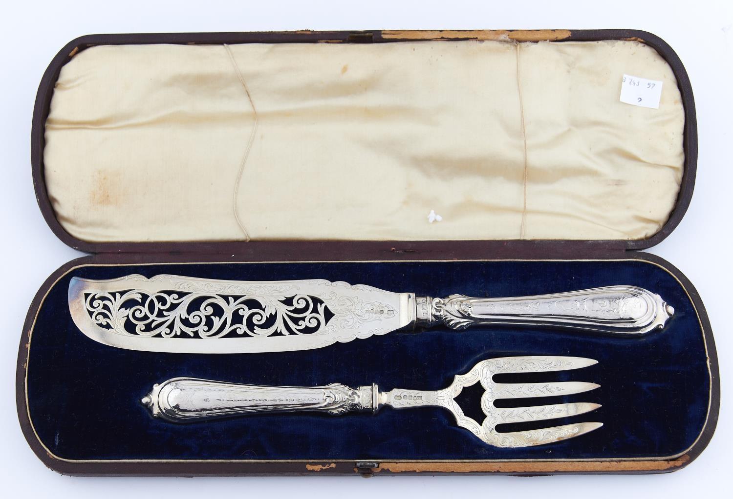 A PAIR OF VICTORIAN PIERCED AND ENGRAVED SILVER FISH SERVERS, MAKER JG, BIRMINGHAM 1853, CASED