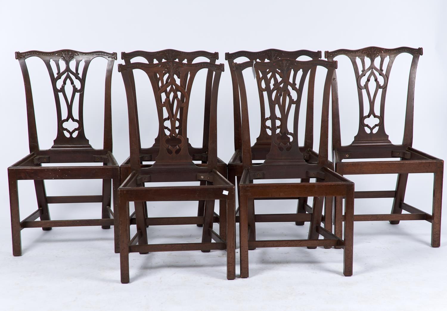 A SET OF SIX MAHOGANY DINING CHAIRS, C1880, IN GEORGE II STYLE, FOLIATE CARVED SERPENTINE CRESTING