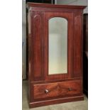 A VICTORIAN MAHOGANY WARDROBE, C1860, WITH FLARED CORNICE ABOVE AN ARCHED MIRRORED CENTRAL DOOR