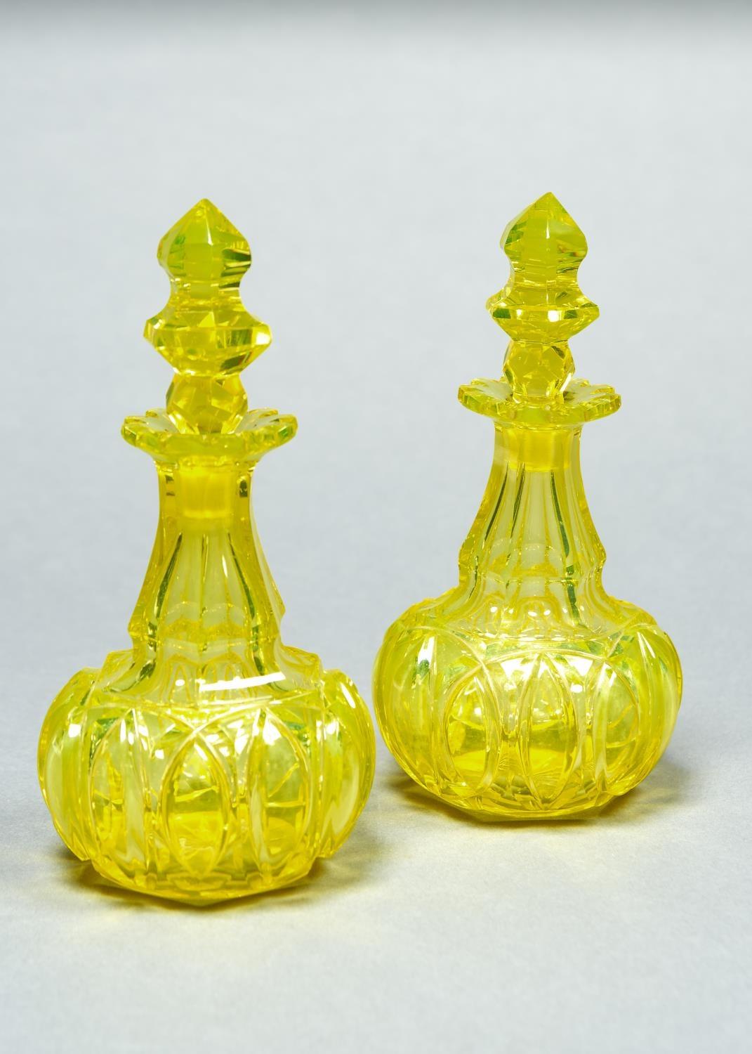 A PAIR OF BOHEMIAN URANIUM GLASS SCENT BOTTLES AND STOPPERS, MID 19TH C, OF GLOBULAR FORM WITH