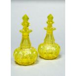 A PAIR OF BOHEMIAN URANIUM GLASS SCENT BOTTLES AND STOPPERS, MID 19TH C, OF GLOBULAR FORM WITH