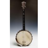 AN IRISH TENOR BANJO, J J ABBOTT, NUMBER 4979, C1920, RETAINING THE ORIGINAL IVORY FRICTION PEGS AND