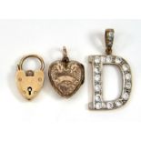 A 9CT GOLD PADLOCK,  BIRMINGMAM 1963,  A HEART SHAPED ENGRAVED GOLD LOCKET AND A PASTE SET  9CT GOLD