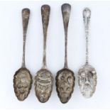 FOUR GEORGE II/III SILVER TABLESPOONS, LATER CHASED AND GILT AS BERRY SPOONS, ALL LONDON, BY VARIOUS