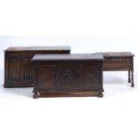 A REPRODUCTION OAK BLANKET BOX IN LATE 17TH C STYLE, THE TOP WITH MOULDED LIP ABOVE A FRONT CARVED