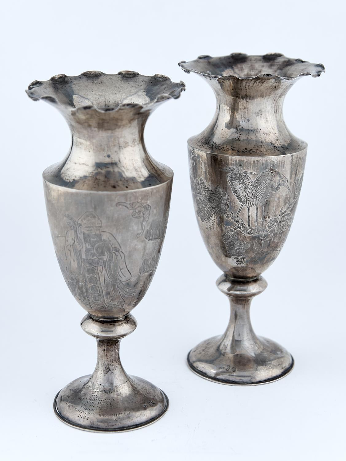 A PAIR OF CHINESE SILVER VASES, C1900  ENGRAVED ON THE SHIELD SHAPED BODY WITH SHOU LAU, DEER, BAT