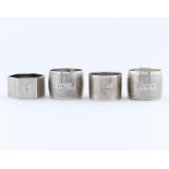 TWO AND A PAIR OF GEORGE VI SILVER NAPKIN RINGS, ENGINE TURNED, THE PAIR BY ISRAEL FREEMAN AND SON