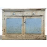 A VICTORIAN PAINTED PINE CUPBOARD, THE RECTANGULAR TOP ABOVE TWO DRAWERS AND PAIR OF PANELLED DOORS,