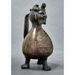 A GERMAN BRONZE AQUAMANILE, LATE 19TH C, OF GOURD SHAPE, THE SPOUT BETWEEN THE HORNS OF THE HEAD