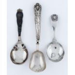 A GEORGE III  SILVER CADDY SPOON, FIDDLE AND SHELL PATTERN, MAKER'S MARK RUBBED, LONDON 1814 AND TWO