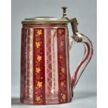 A BOHEMIAN PEWTER MOUNTED, RUBY CASED, ETCHED AND GILT GLASS TANKARD, C1860, GILT IN UPRIGHT