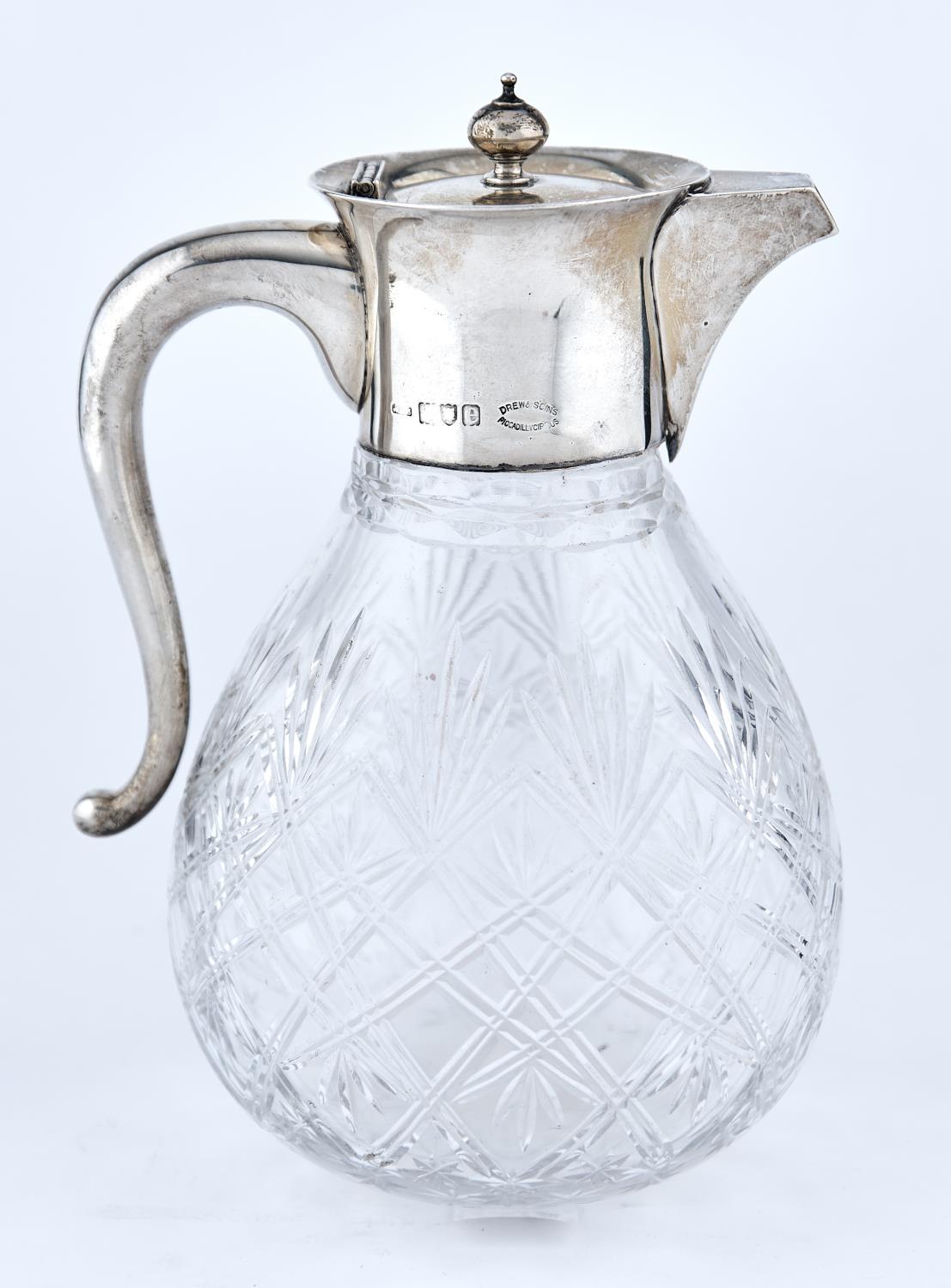 A VICTORIAN SILVER MOUNTED CUT GLASS CLARET JUG, OF BAG SHAPE, 19.5CM H, MARKS RUBBED, LONDON 1900