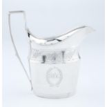 A GEORGE III SILVER CREAM JUG, OF FLARED OVAL SHAPE WITH ENGRAVED BAND, REEDED RIM AND HANDLE, 12.