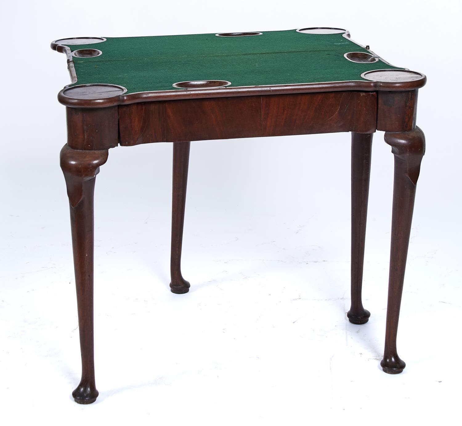 A GEORGE II MAHOGANY CARD TABLE, C1750, THE TOP WITH PAIR OF ROUNDED ANGLES REVEALING A GREEN - Image 2 of 2