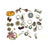 A MARCASITE AND ENAMEL ORCHID BROOCH, AN AMBER AND SILVER BROOCH AND MISCELLANEOUS SILVER, AND OTHER