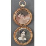 Photographic jewellery. A Victorian gold back-and-front locket containing a pair of daguerreotypes