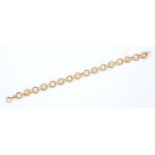 A 9ct gold bracelet of linked circles, 19cm l, Birmingham 1960, 14.5g Good condition