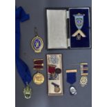 Masonic interest. A silver gilt and blue engine turned enamel Nottinghamshire assistant medallion,