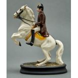 A Beswick equestrian figure of a Lipizzaner with rider, second version, pre 1981, 24cm h, printed