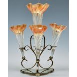 An Edwardian EPNS flower stand with four iridescent glass trumpet shaped vases, 30cm h Plating