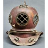 A reproduction copper and brass diver's helmet, 41cm h Much dirt from long term storage in an
