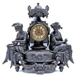 A French fin de siecle bronzed spelter mantel clock, c1900, in the form of a pedestal surmounted