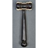 A Victorian ivory and ebony gavel, late 19th c, turned head and handle, 15cm l Good condition