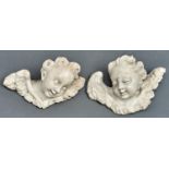 English School, 18th c - The Heads of two Cherubim, well carved with ecstatic expressions,